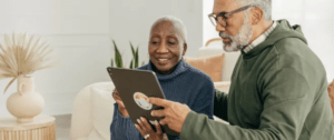 older couple looking at tablet