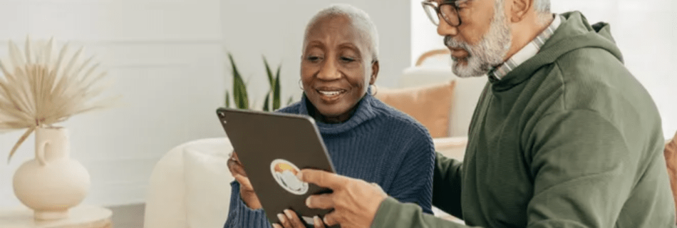 older couple looking at tablet